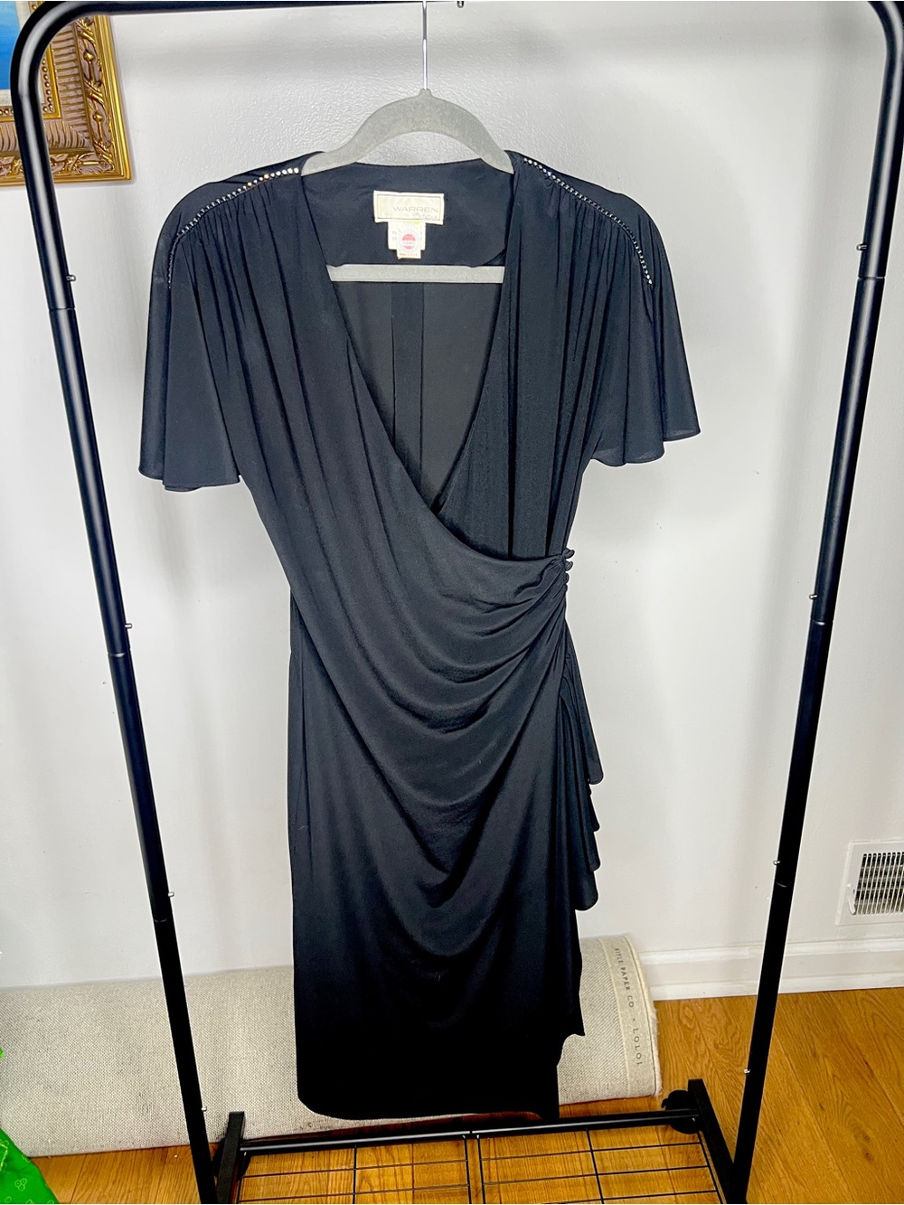 Black vintage 70s Warren dress with beaded details and draped neckline. Size M